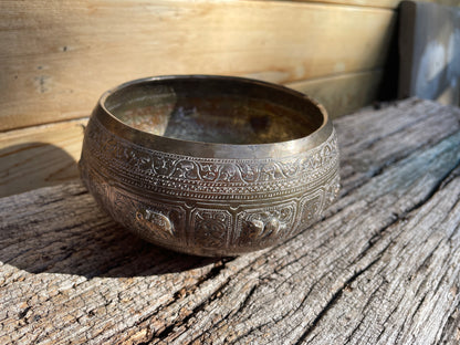 Indian white metal bowl heavily embossed with wild creatures 13cm diameter 141g