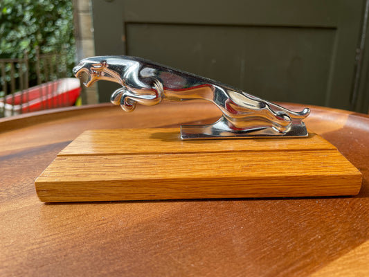 Jaguar car  mascot mounted on oak plinth 15cm long