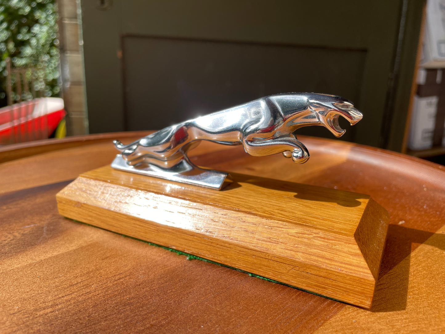 Jaguar car  mascot mounted on oak plinth 15cm long