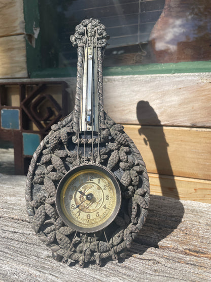 Working Aesthetic silver clock and thermometer in Mandolin form