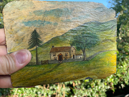 Hand painted unique folk art painting of a Welsh cottage inscribed 'Bwthyn Bach to Gwelt' on slate