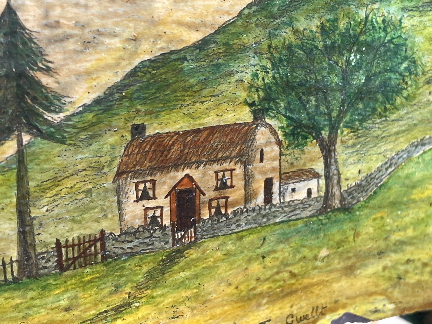 Hand painted unique folk art painting of a Welsh cottage inscribed 'Bwthyn Bach to Gwelt' on slate