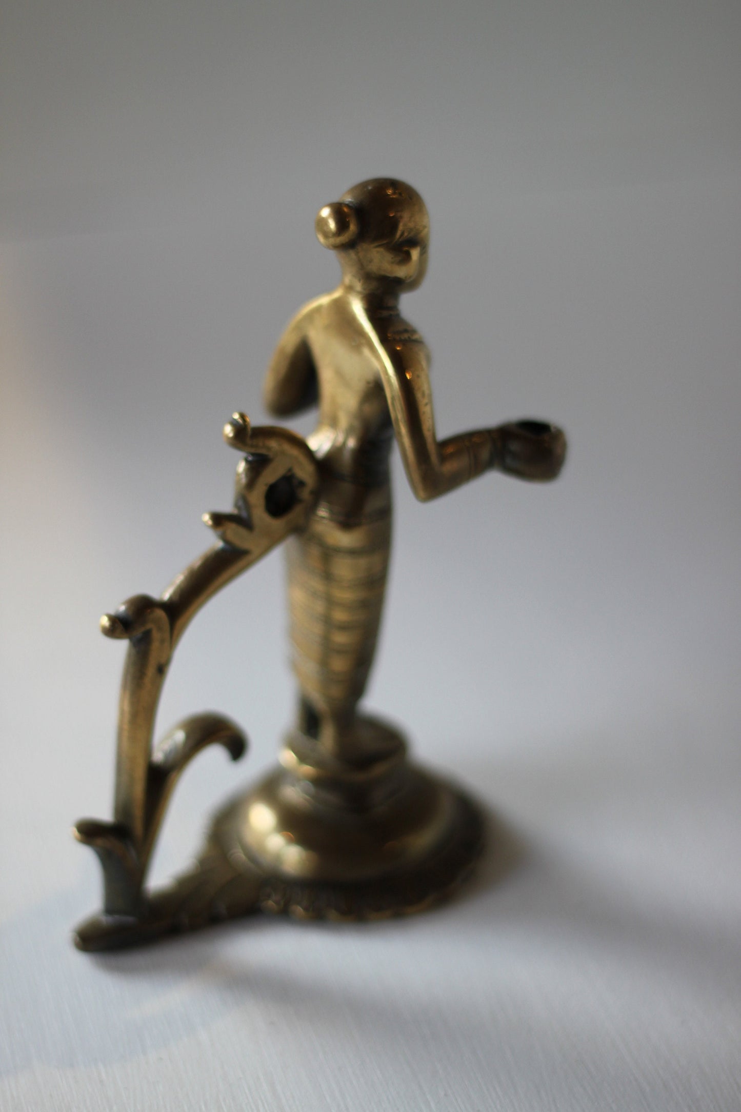 heavy cast brass Indian figure incense holder