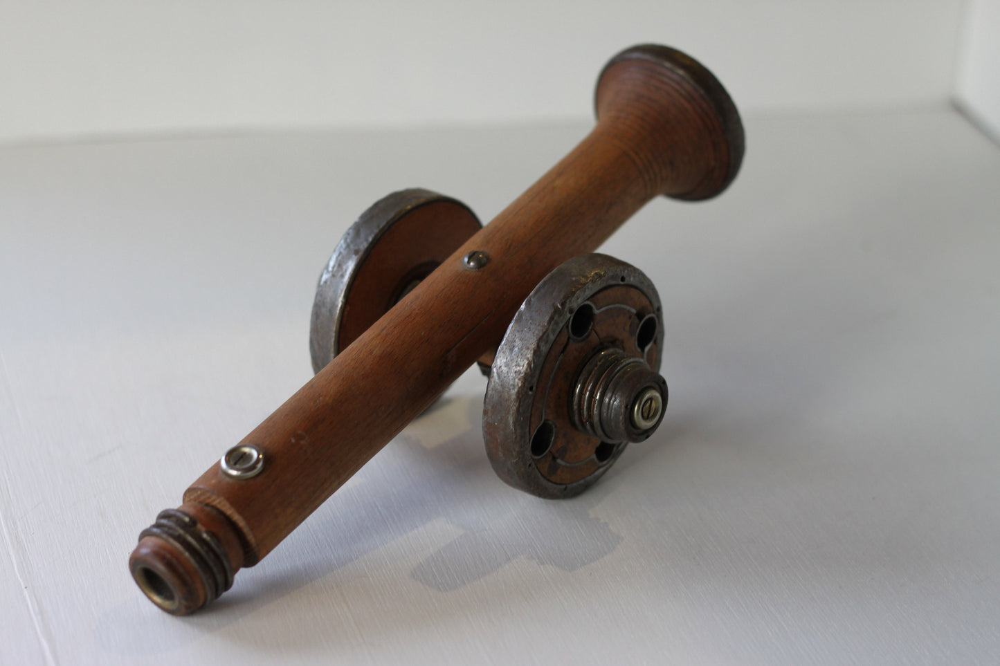 A Folk art model of a Cannon made from Antique Bobbins and Pins from The Pennines.