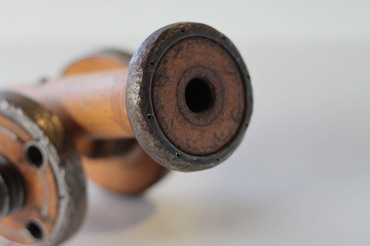 A Folk art model of a Cannon made from Antique Bobbins and Pins from The Pennines.