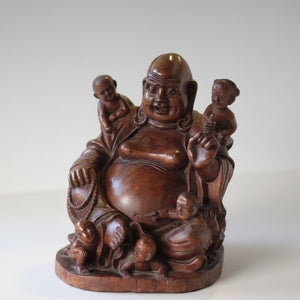 Chinese, hand carved, unique wood Group of Budai and five infants