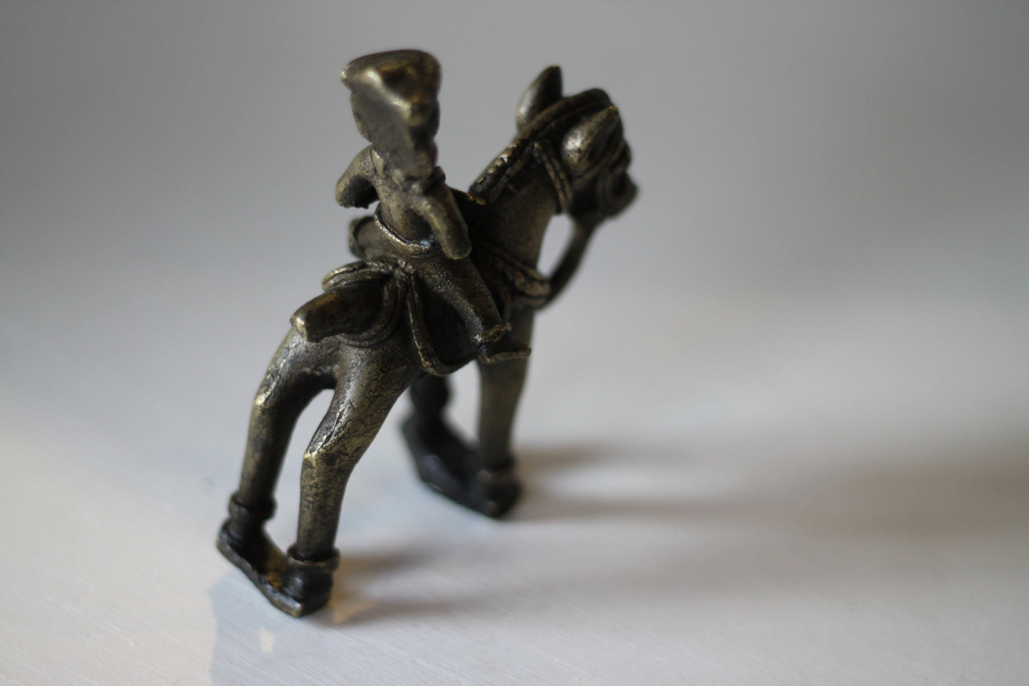 Cast brass of an Indian figure on a horse