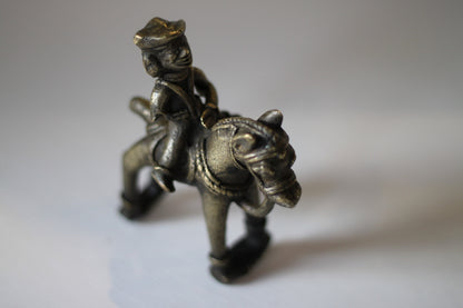 Cast brass of an Indian figure on a horse