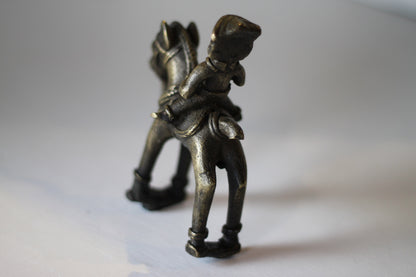 Cast brass of an Indian figure on a horse