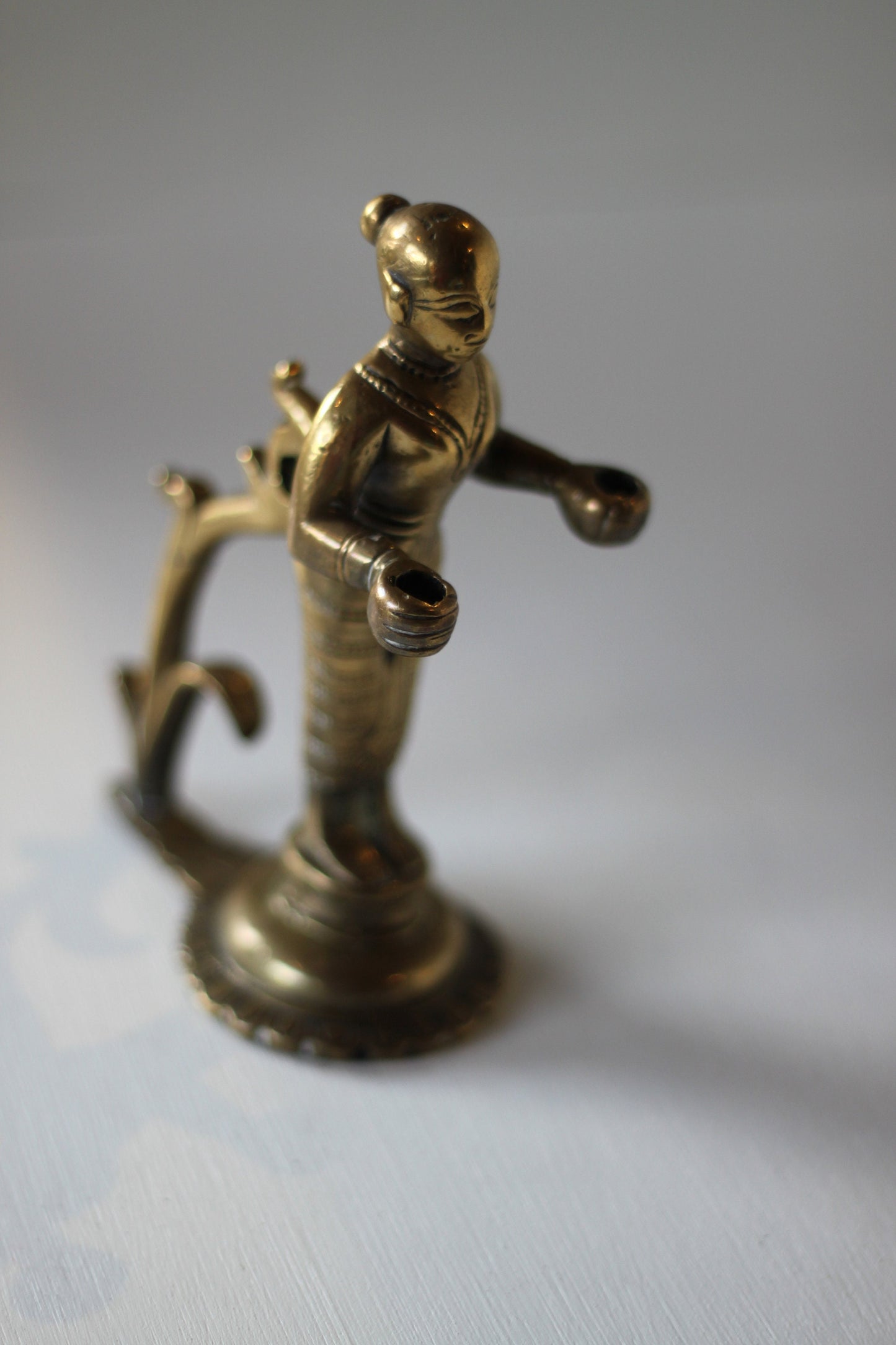 heavy cast brass Indian figure incense holder