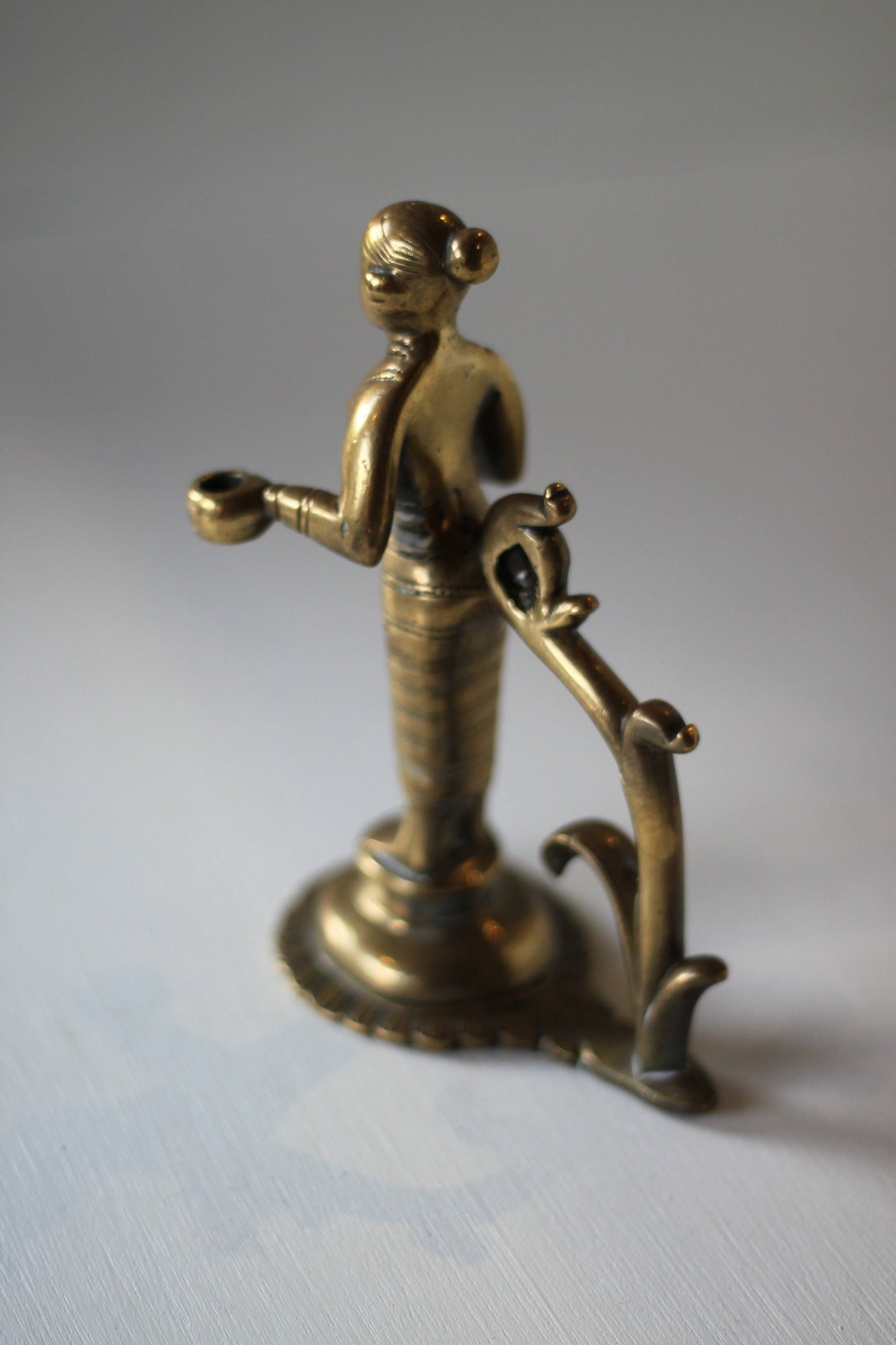 heavy cast brass Indian figure incense holder