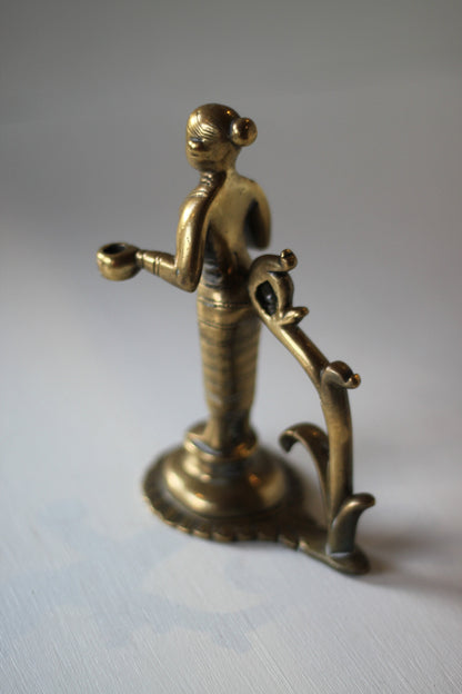 heavy cast brass Indian figure incense holder