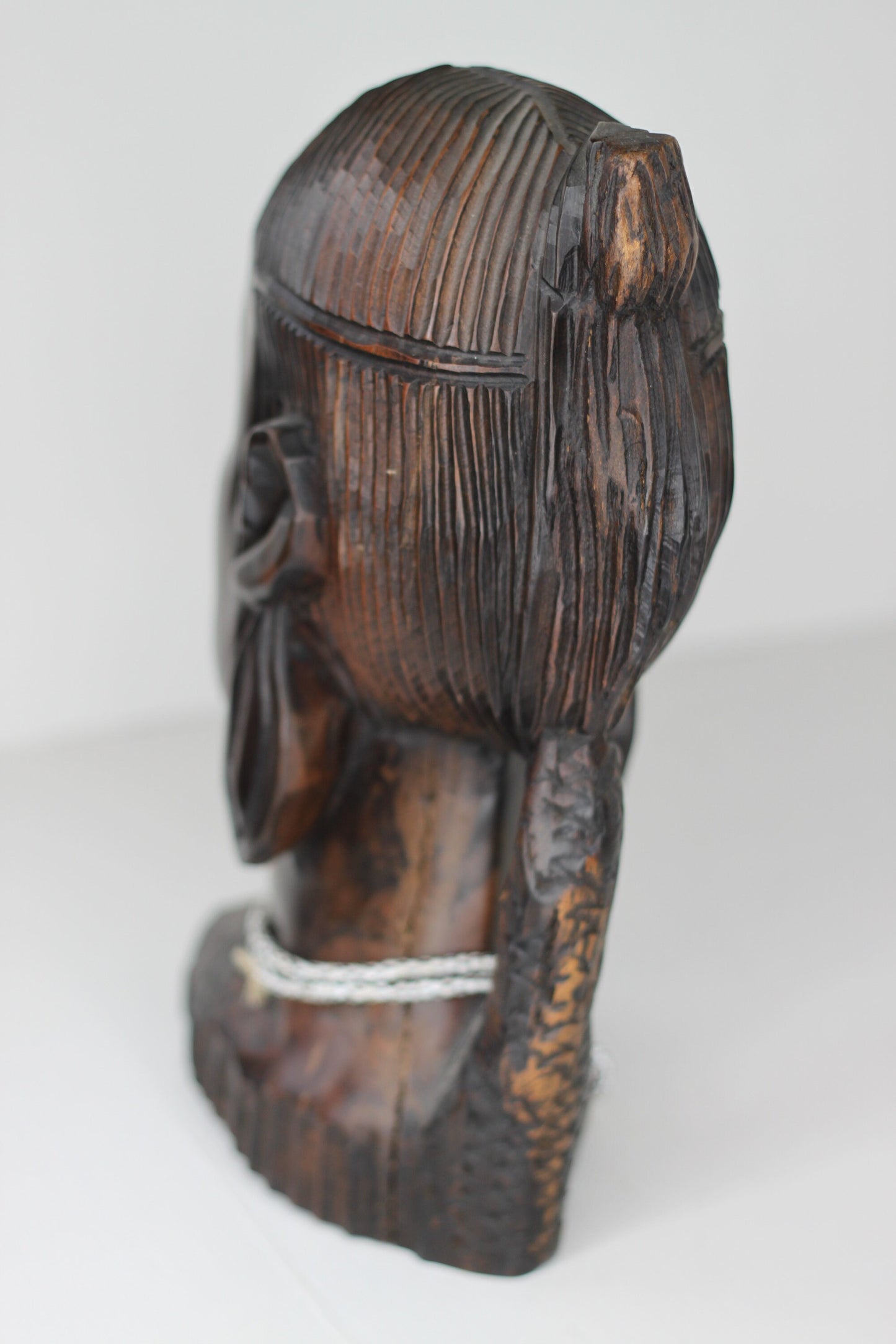 A substantial African hard wood carving of a female's head