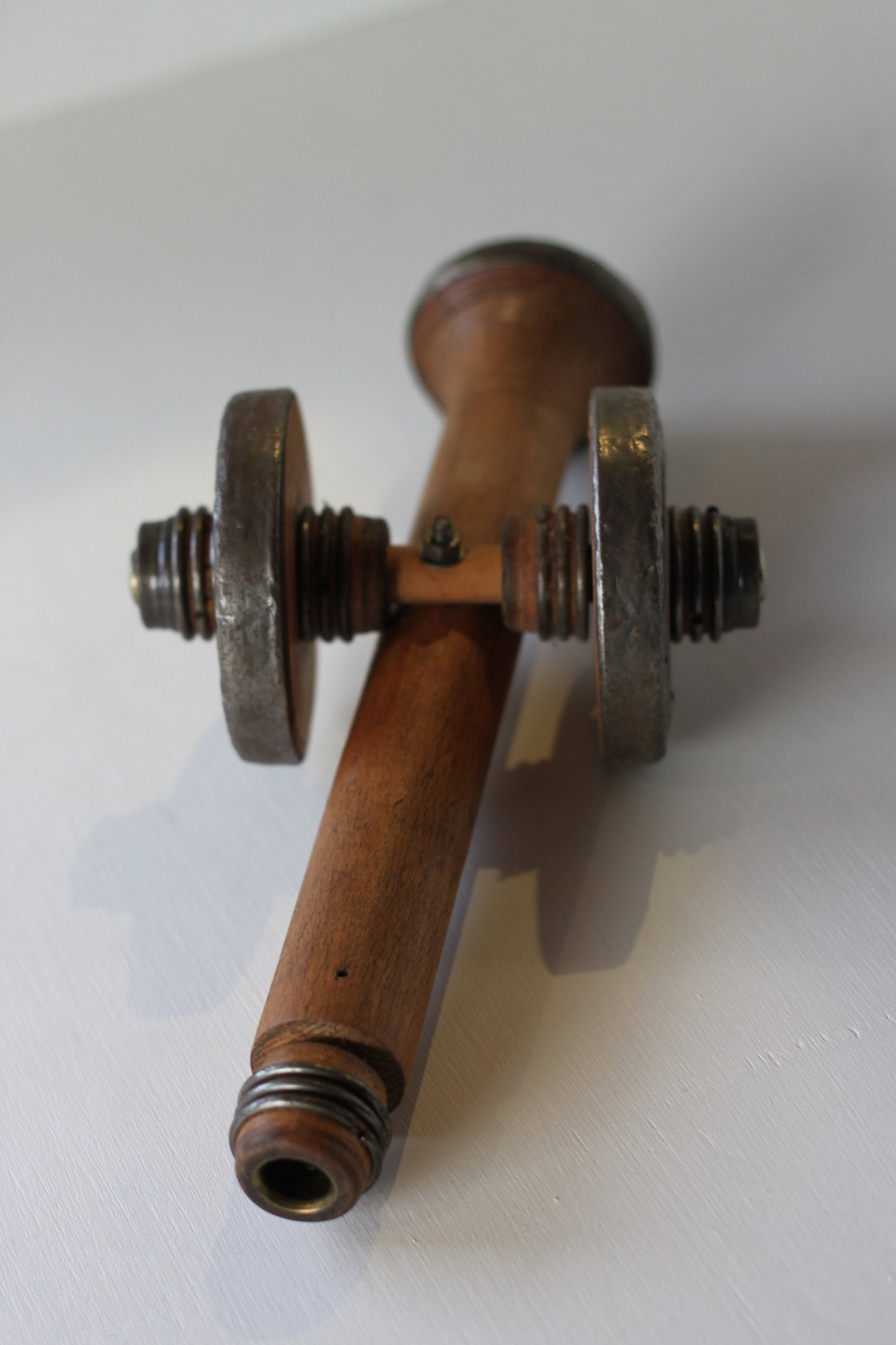 A Folk art model of a Cannon made from Antique Bobbins and Pins from The Pennines.