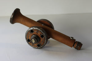 A Folk art model of a Cannon made from Antique Bobbins and Pins from The Pennines.