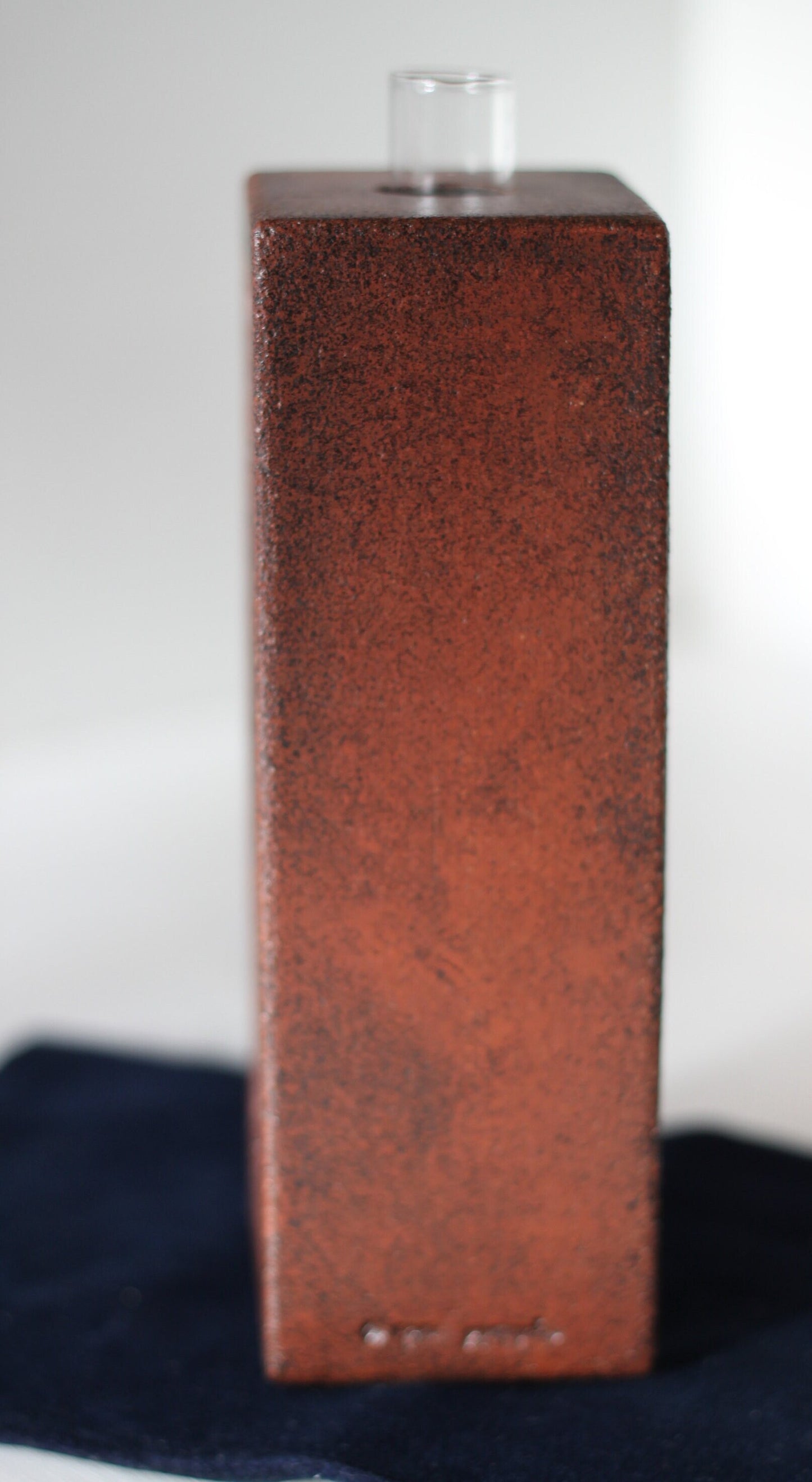 A Studio Pottery Glazed Brick-Form Test Tube Rack Vase