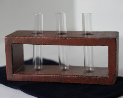 A Studio Pottery Glazed Brick-Form Test Tube Rack Vase