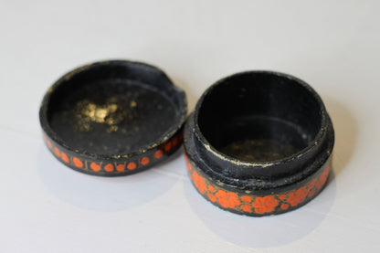 an Indian lacquered papier-mch box and cover hand painted with orange flowers