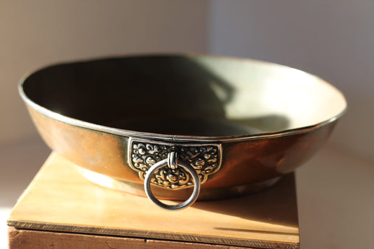 A Hand Made Tibetan Copper Bowl With Single Decorative Silver (white metal) Handle and Rim