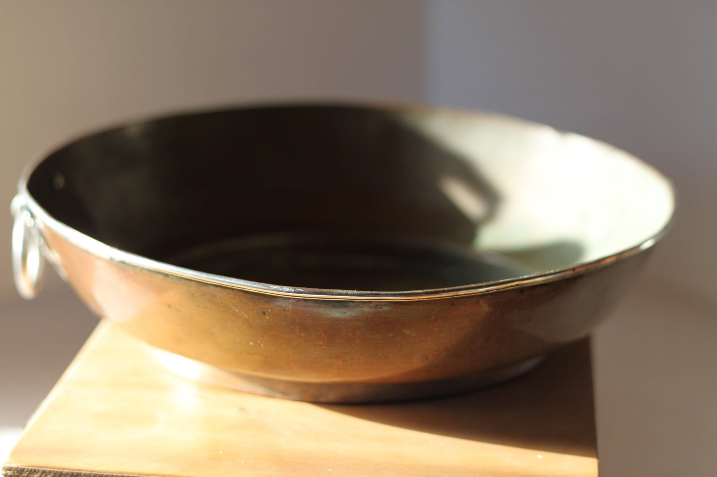 A Hand Made Tibetan Copper Bowl With Single Decorative Silver (white metal) Handle and Rim