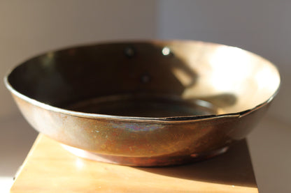 A Hand Made Tibetan Copper Bowl With Single Decorative Silver (white metal) Handle and Rim