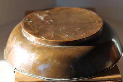 A Hand Made Tibetan Copper Bowl With Single Decorative Silver (white metal) Handle and Rim