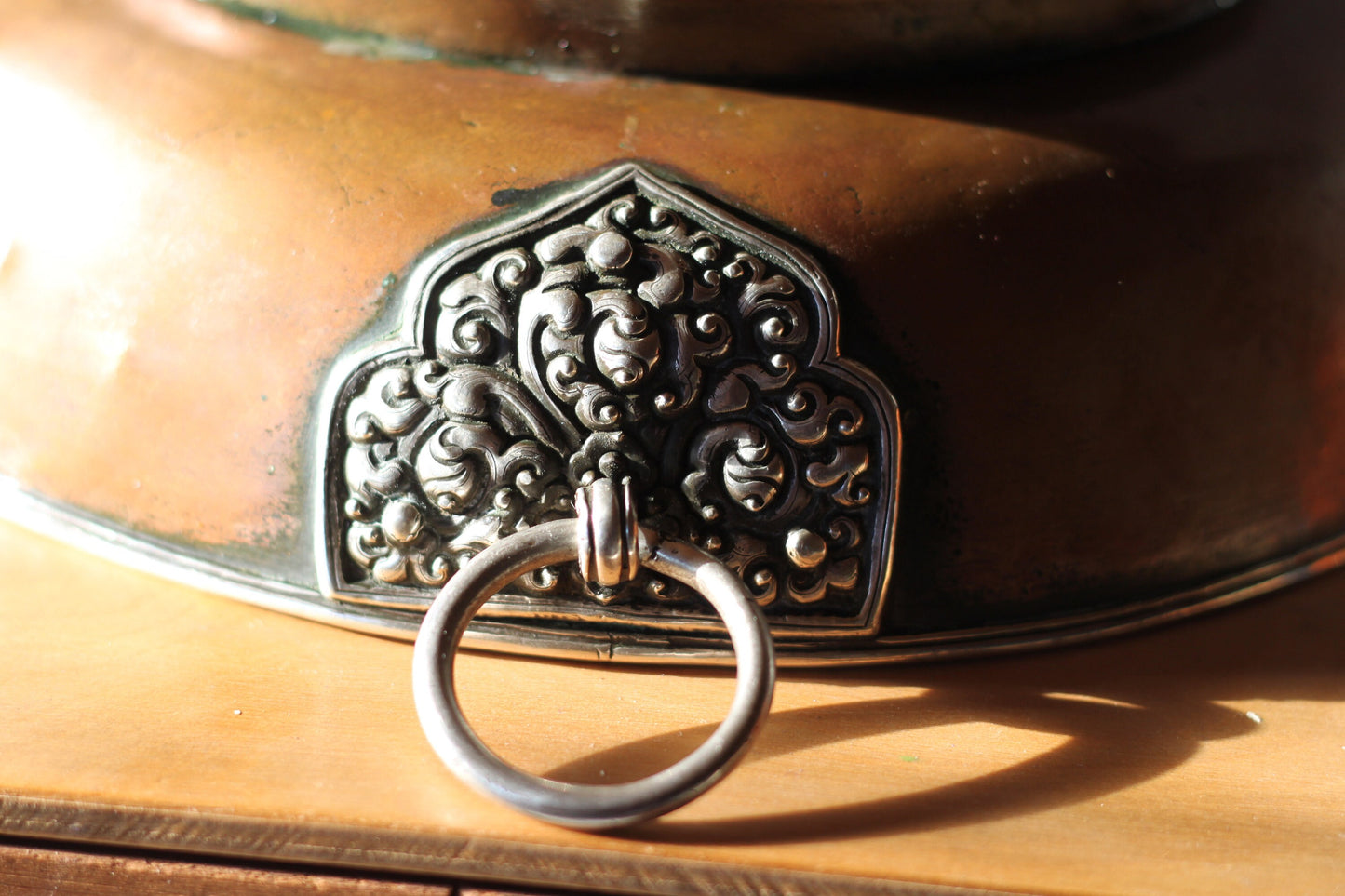 A Hand Made Tibetan Copper Bowl With Single Decorative Silver (white metal) Handle and Rim