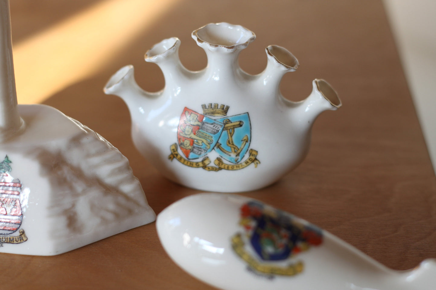 W.H Goss Crest Ware Eastbourne Lighthouse - Arkinstall and Son Brighton Torpedo - Hastings and St Leonards Crest Ware Multi Fluted Vase