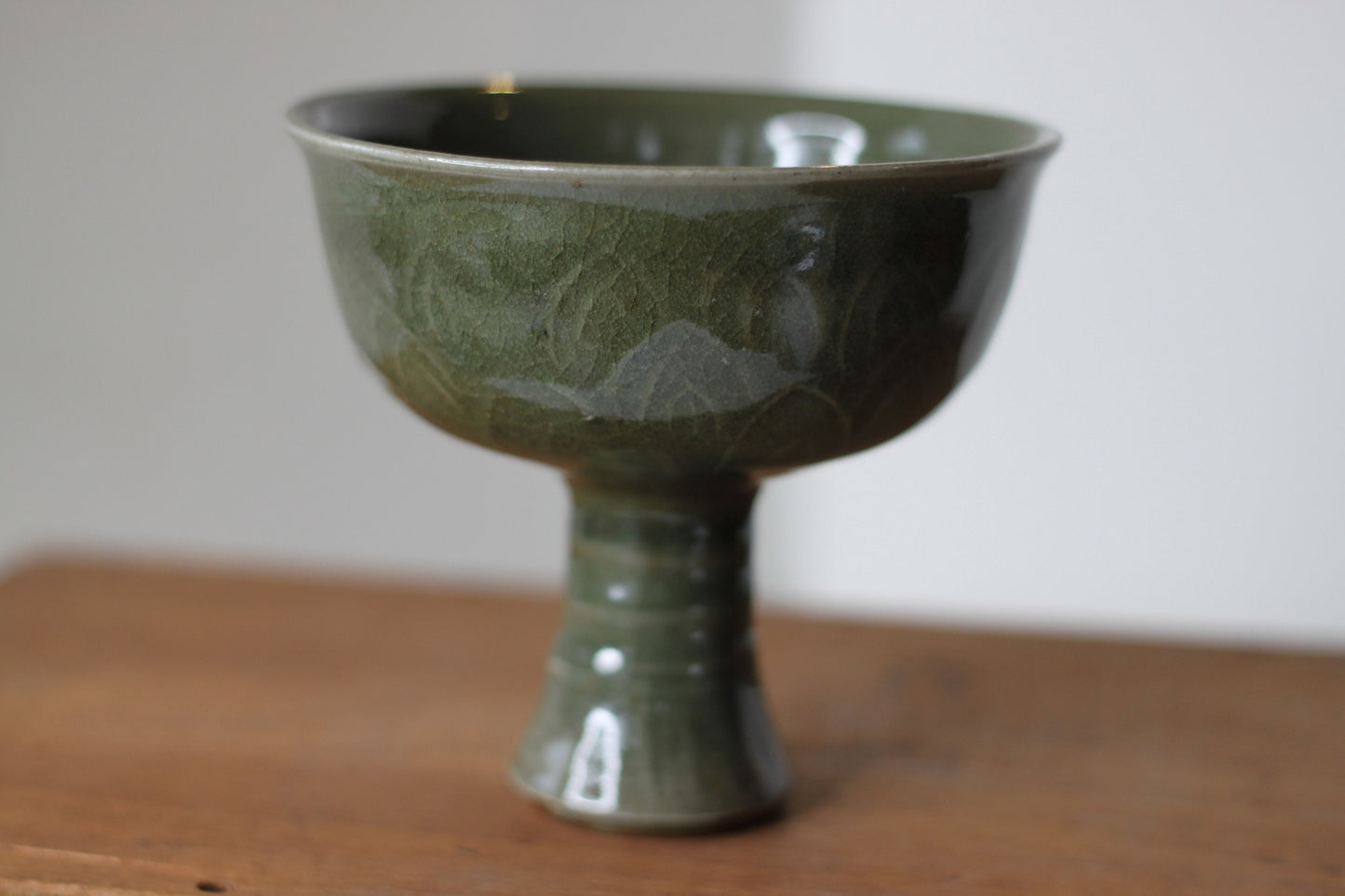 A Chinese Celadon Stem Cup, The Bowl Interior Decorated With Dragons, 12cm Tall