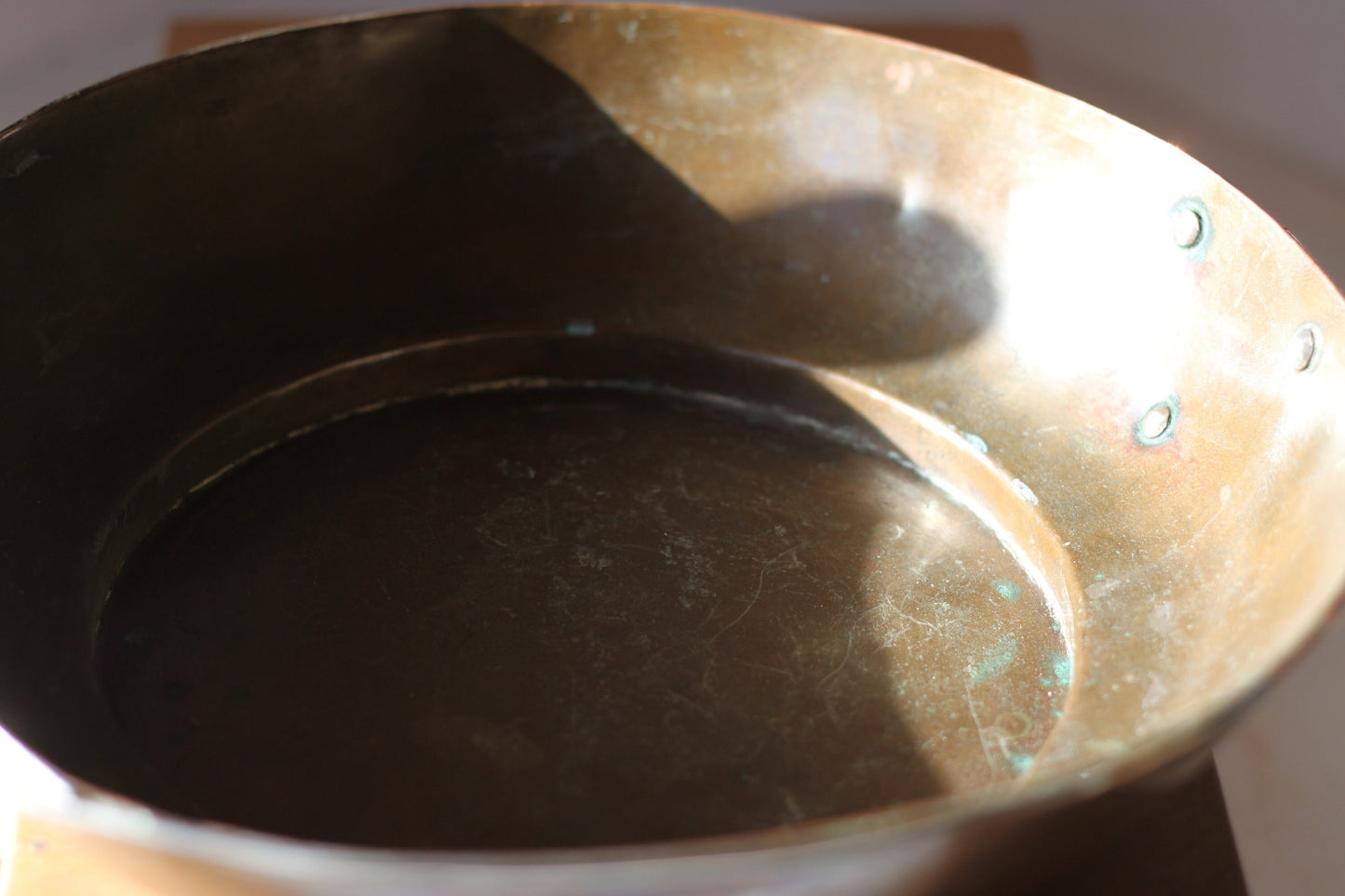 A Hand Made Tibetan Copper Bowl With Single Decorative Silver (white metal) Handle and Rim