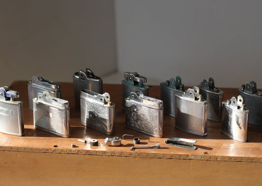 Twelve Vintage Fuel Lighters in Need or Repair Incl. Four Mosda Streamline 500's  a Auer Champion, Firefly, Hadson and  Field Brands