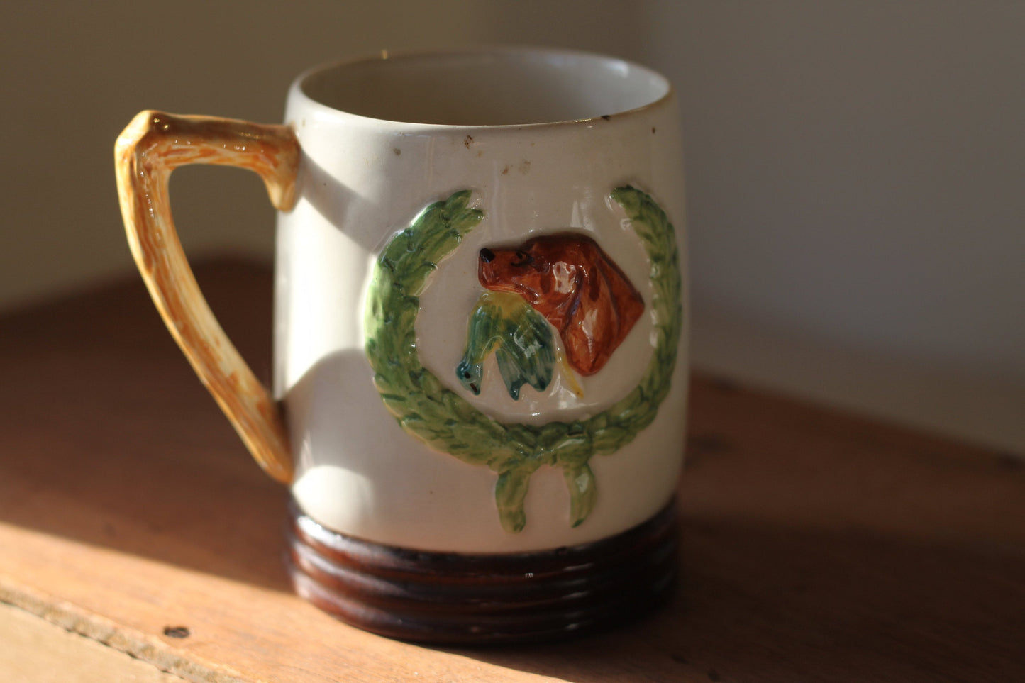 A country scene mug with a game farmer and his dog