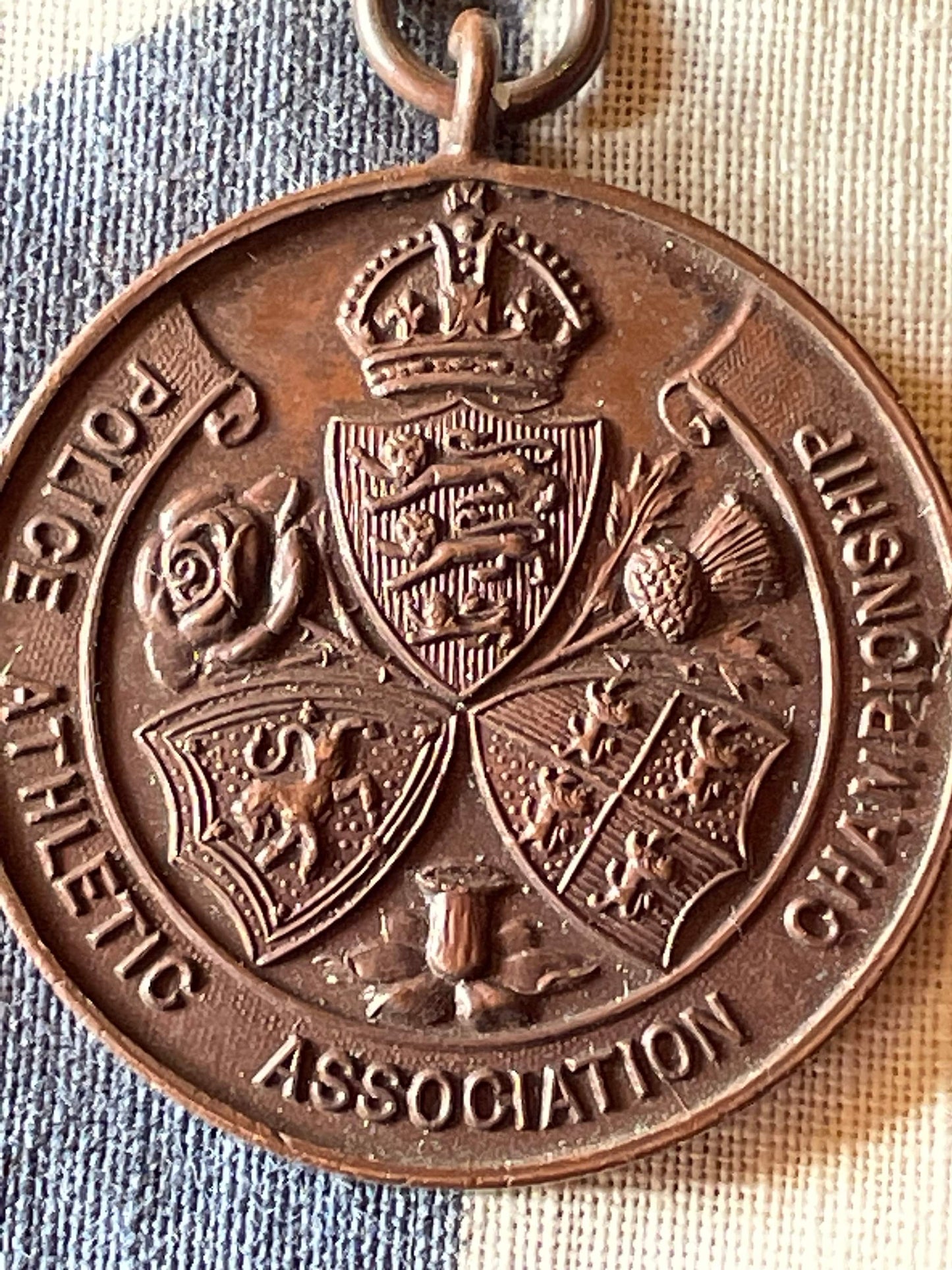 A medallion Fob for the Police Athletic Association Championship Standard 1932 High Jump