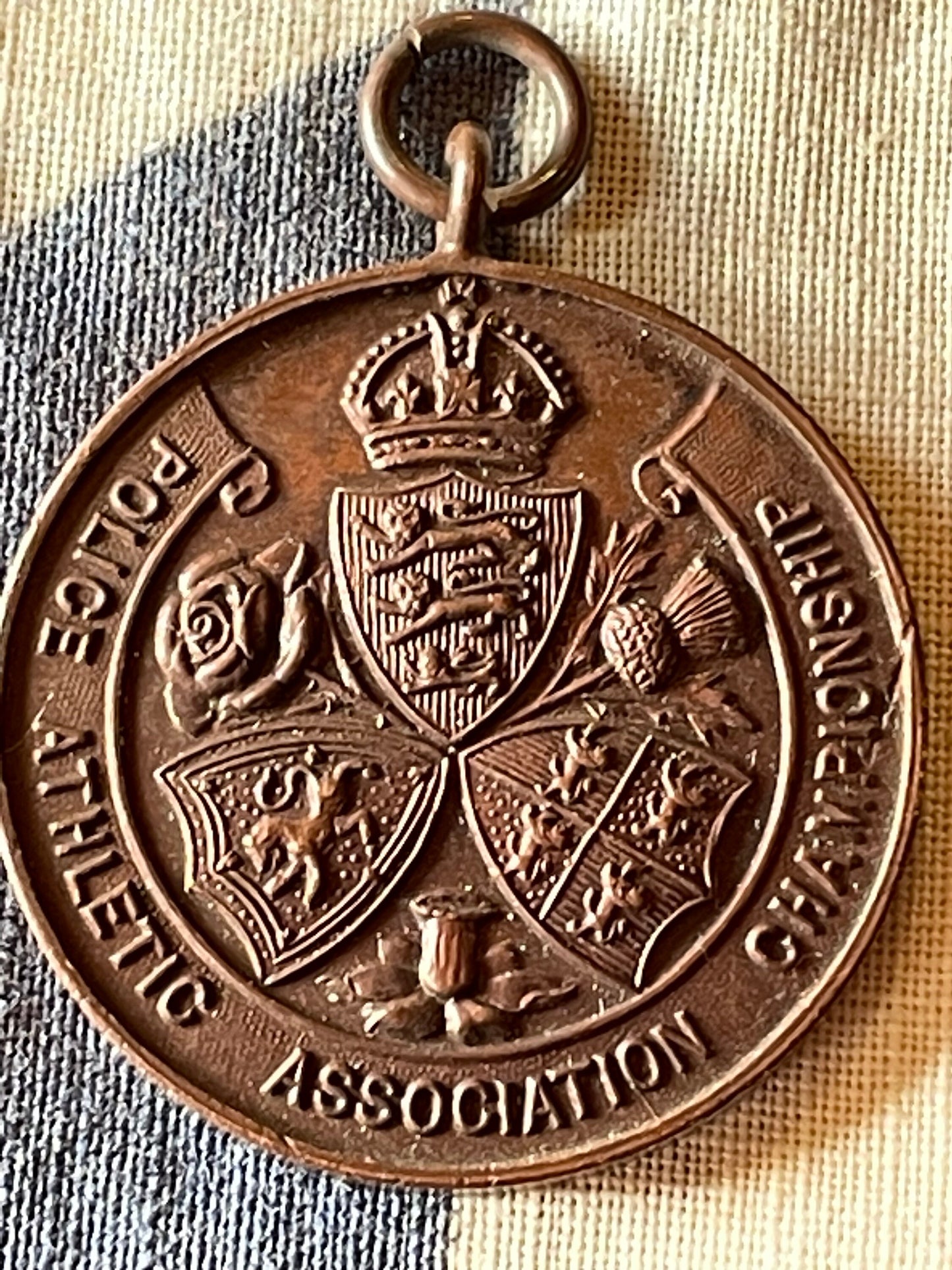 A medallion Fob for the Police Athletic Association Championship Standard 1932 High Jump