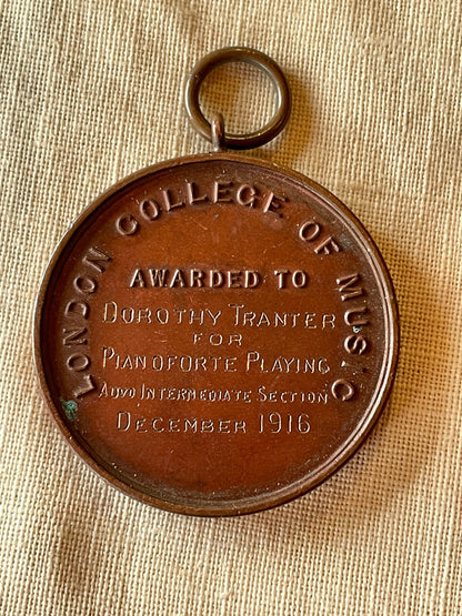 A Medallion Fob From The London College of Music Awarded to Dorothy Tranter for Pianoforte Playing Intermediate Section December 1916