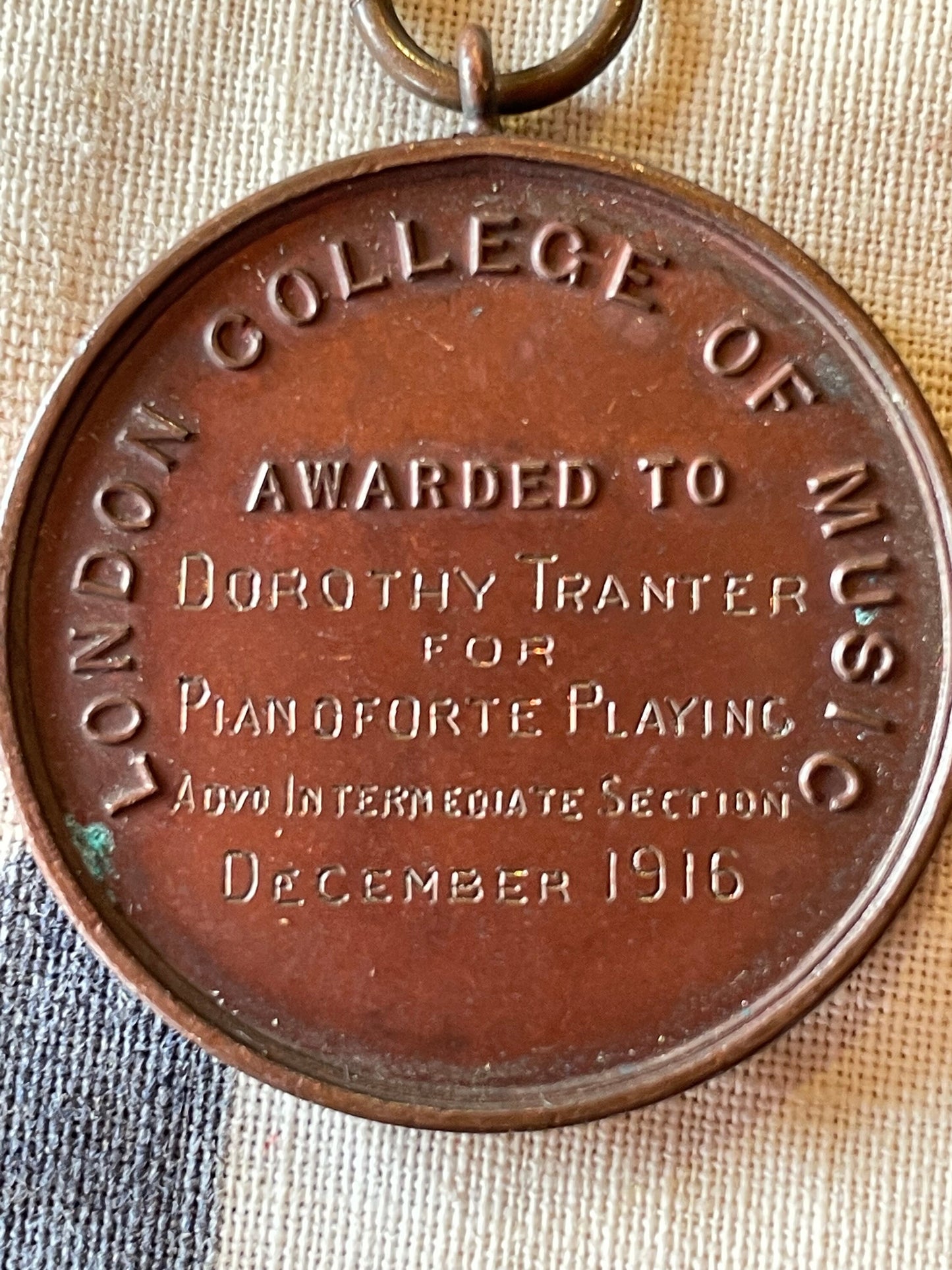 A Medallion Fob From The London College of Music Awarded to Dorothy Tranter for Pianoforte Playing Intermediate Section December 1916