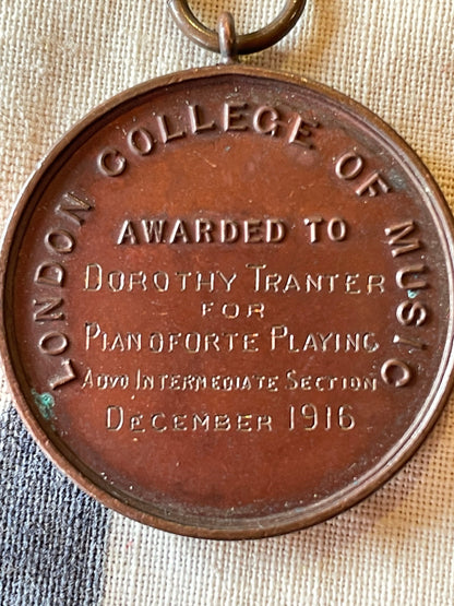 A Medallion Fob From The London College of Music Awarded to Dorothy Tranter for Pianoforte Playing Intermediate Section December 1916