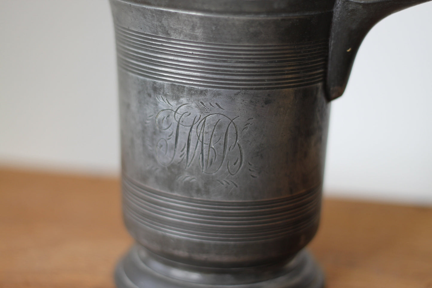 A 19th Century Pewter Side-Pouring Jug With Verification Marks, Engraved Cartouche and Base With a W&M Stamp