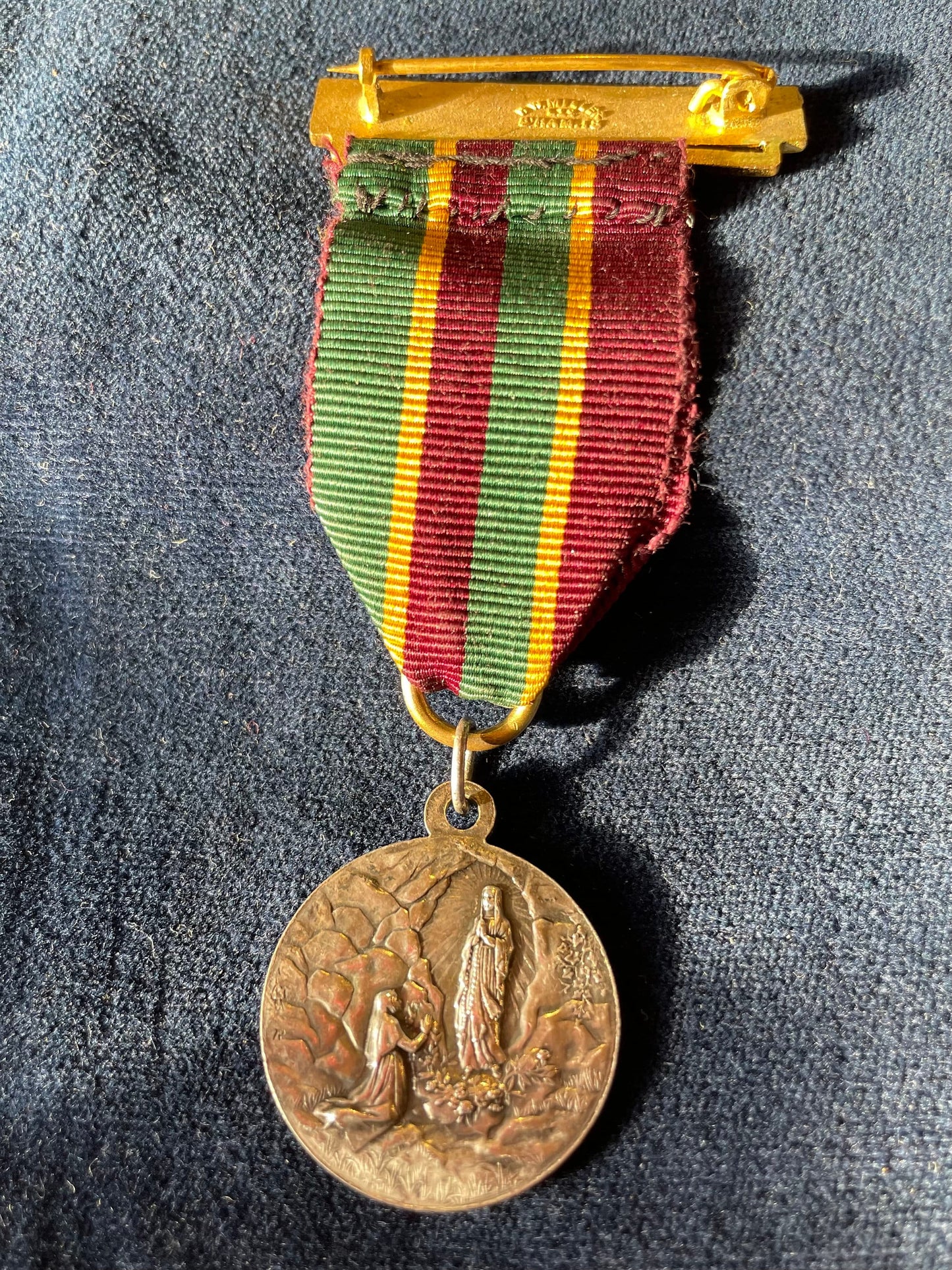 A Pendant Fob charm of - "Our Lady of Lourdes" forming a  WIMBLEDON medal likely from Wimbledon College  by H W Miller Birmingham