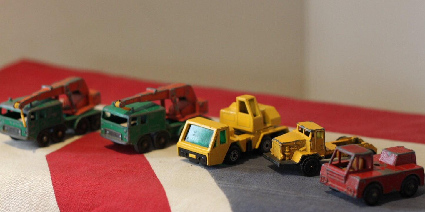 five diecast crane and dump truck toys by Corgi and  Lesney from the 1960's and 70's - in Original Unrestored Condition