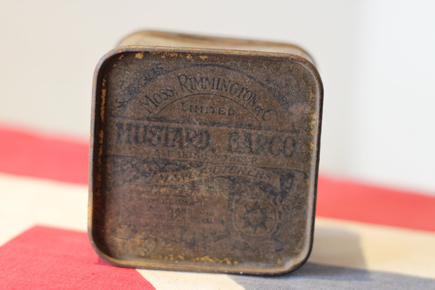 A late Victorian Antique Lithographed Tin From 'Moss Rimmington Ltd Mustard Barco and Baking Powder' Decorated With Horses and Riders