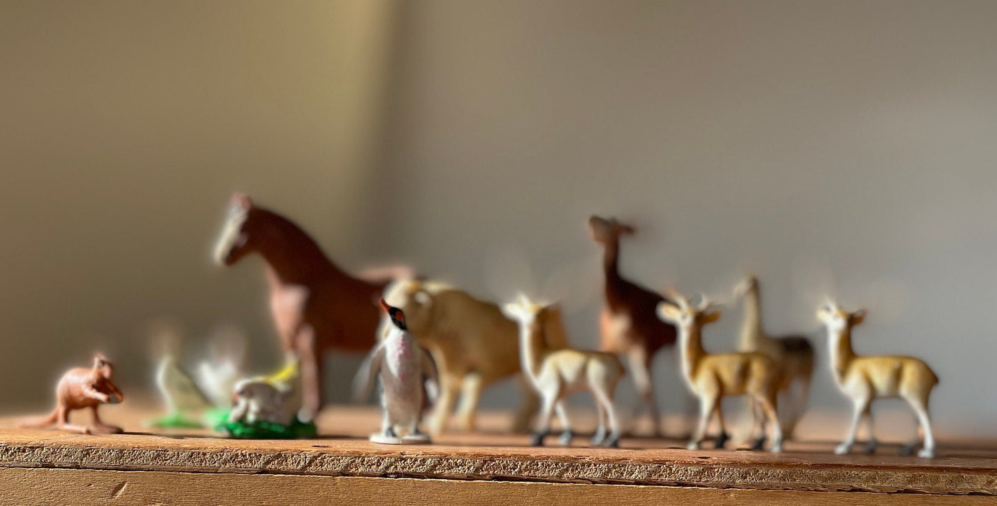 A Collection of 1970's Plastic Animals- A Britains Ltd England Horse, Lamar and Akapi The Rest made in Hong Kong