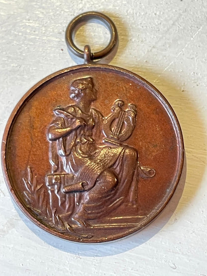 A Medallion Fob From The London College of Music Awarded to Dorothy Tranter for Pianoforte Playing Intermediate Section December 1916