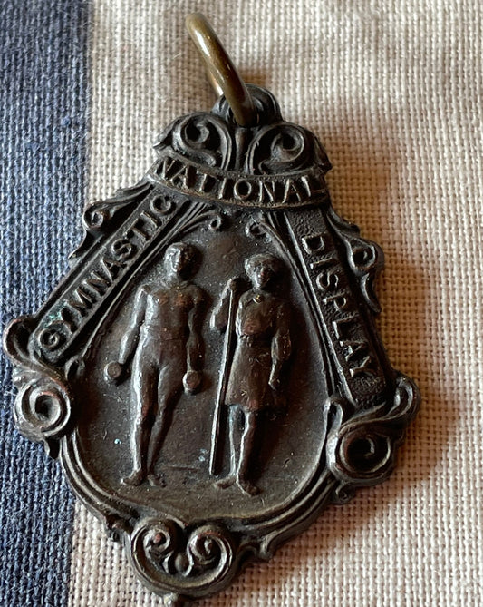 National Gymnastic Display Medal fob Male/ Female Athletes British School c1910