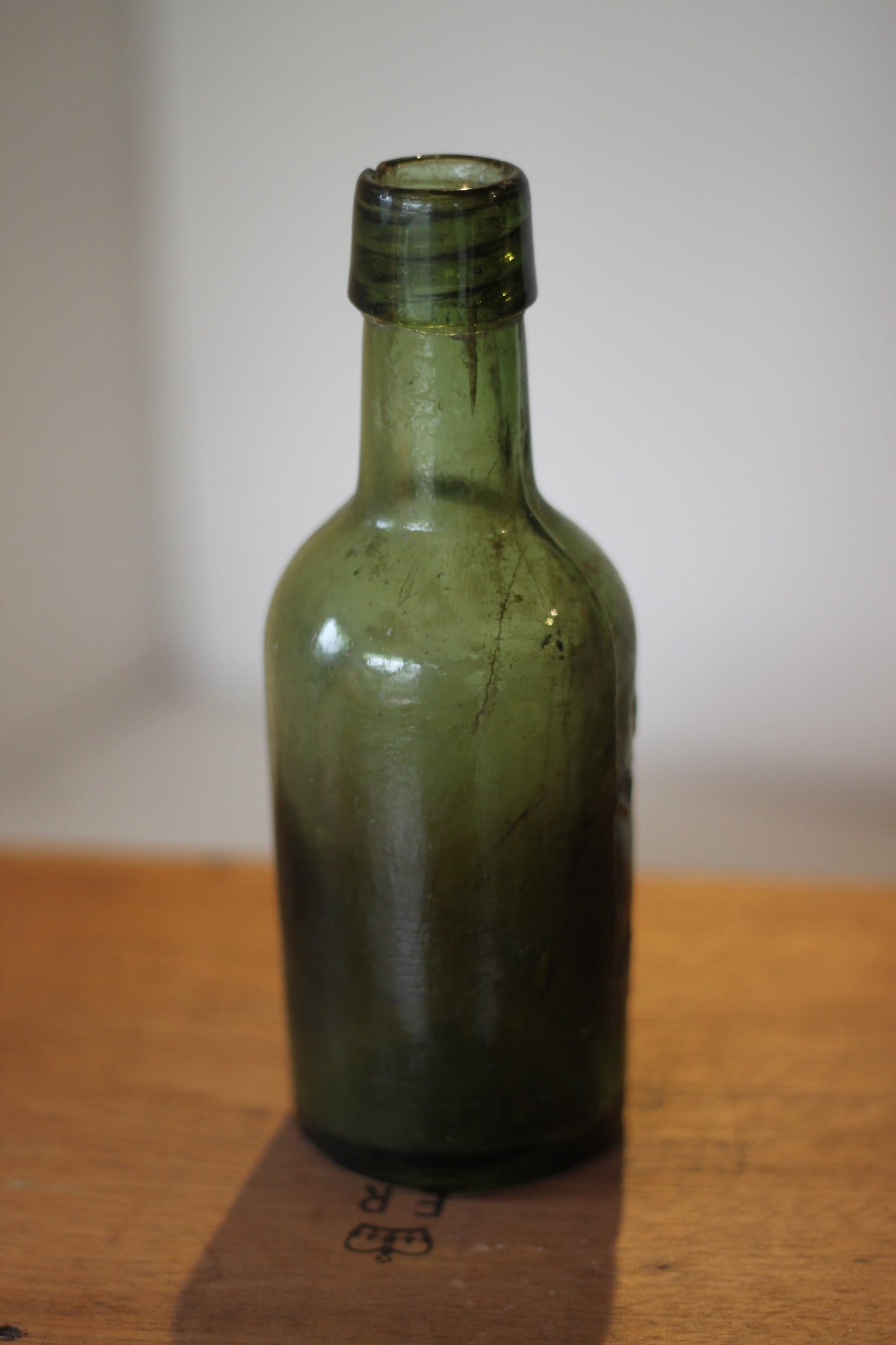 A Vintage Green Beer Bottle Embossed B Cunningham Warrington 19.5cm Tall