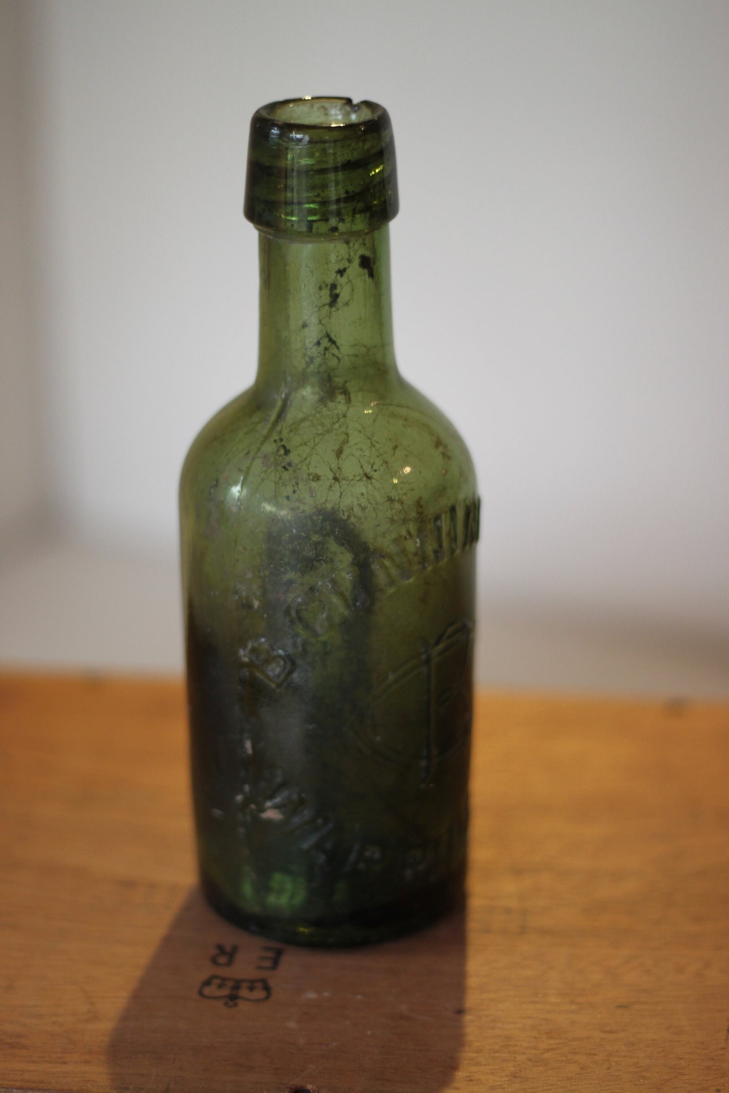 A Vintage Green Beer Bottle Embossed B Cunningham Warrington 19.5cm Tall