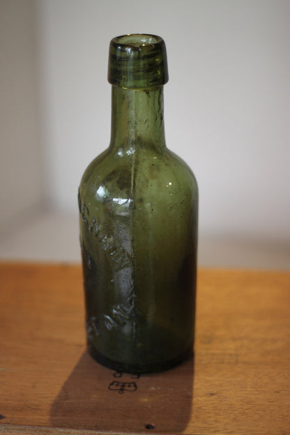 A Vintage Green Beer Bottle Embossed B Cunningham Warrington 19.5cm Tall