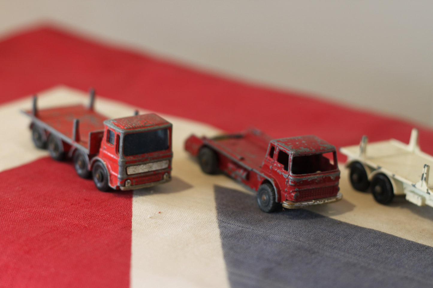 Four Diecast Metal Matchbox Lesney and Husky Toy Trucks From The 1960's