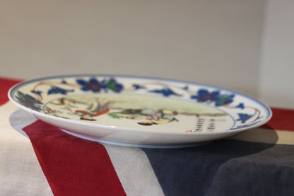 A Chinese porcelain plate with 4 character mark and script 24.5cm dia