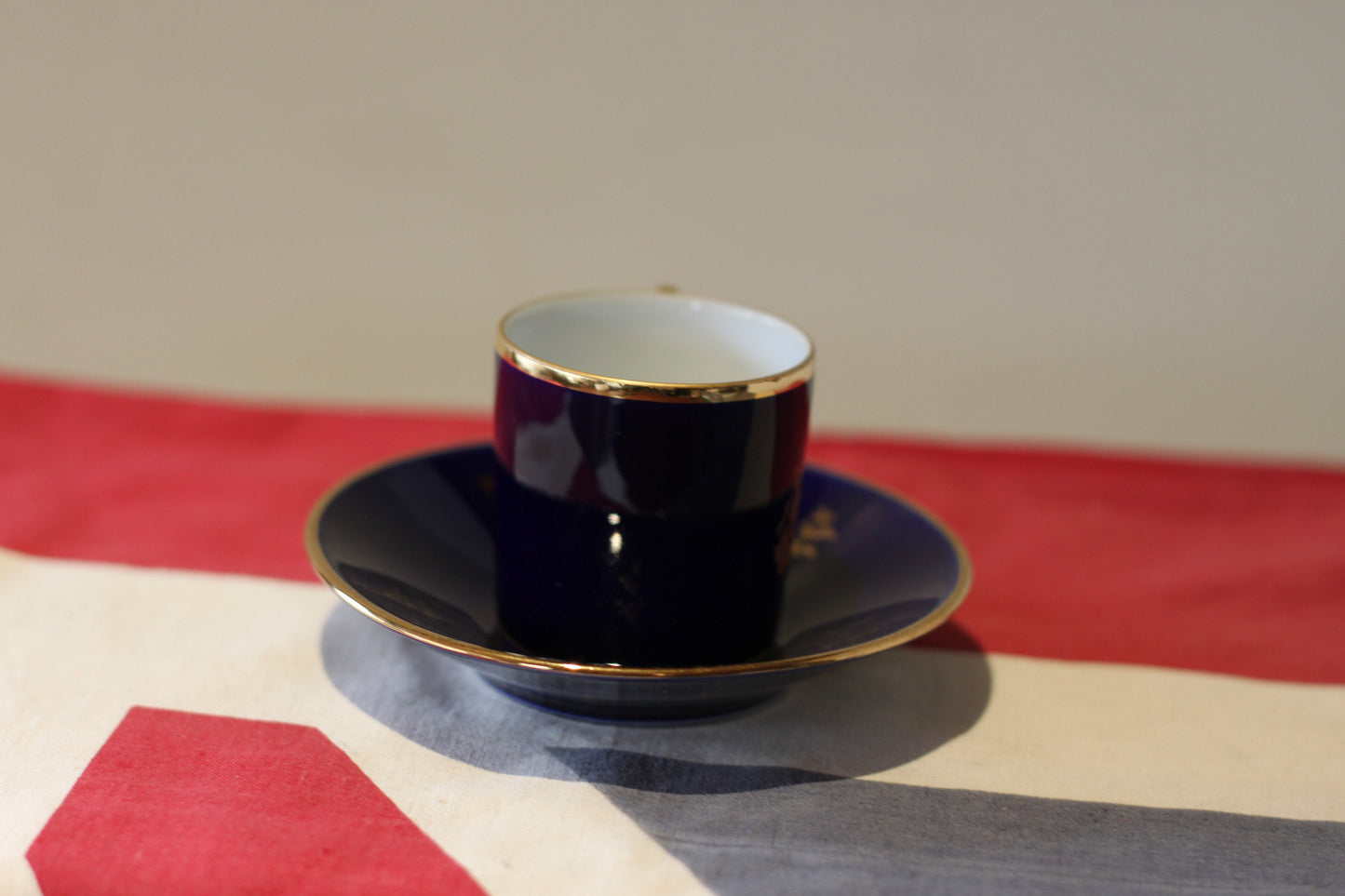 A Porcelain 'Florance Limoges' Coffee Cup and Saucer From France